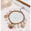 Bracelet breloques coquillages & soleil Bracelet breloques coquillages & soleil
