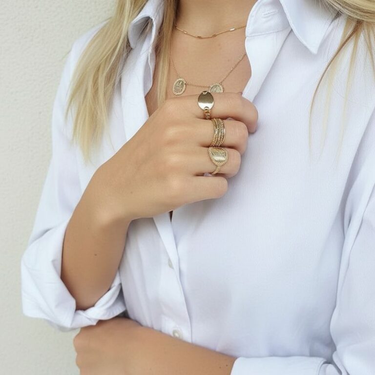 bague femme plaqué or 18 carats médaille motif végétal