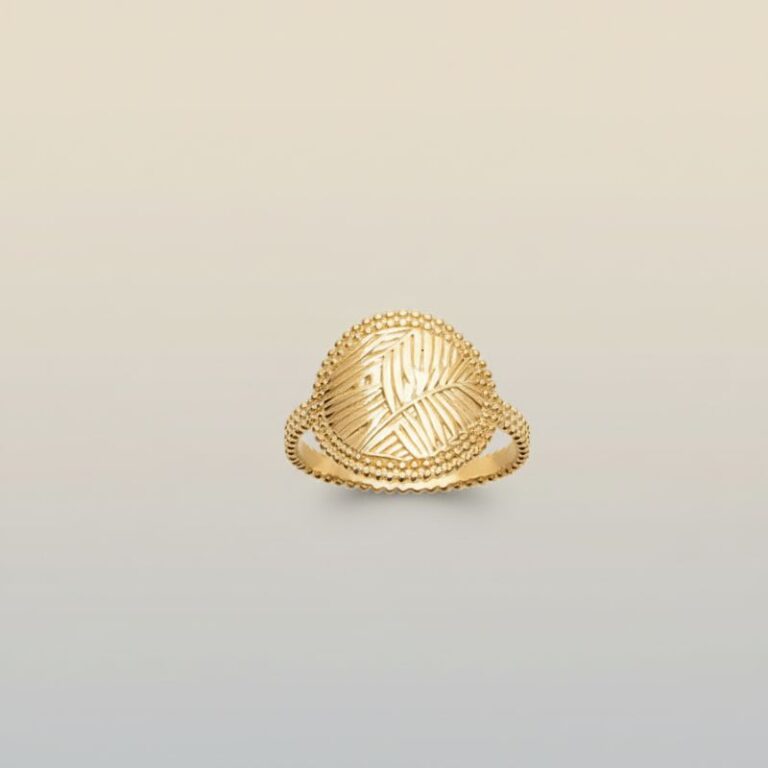 bague femme plaqué or 18 carats médaille motif végétal