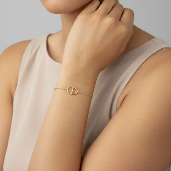 bracelet plaqué or 18 carats pour femme maille marine stylisée CD