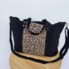 cabas en daim noir empiècement imprimé léopard mode tendance